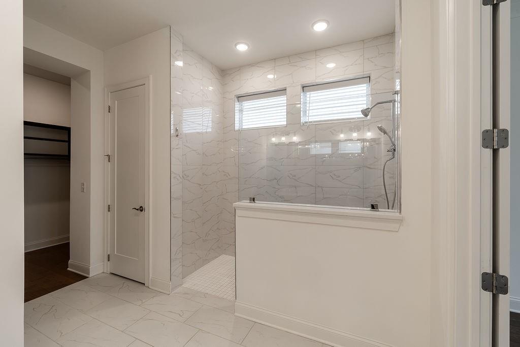 6954 Scenic Overlook Trace Flowery Branch, GA 30542 - Photo 31 of 55 a bathroom with a shower