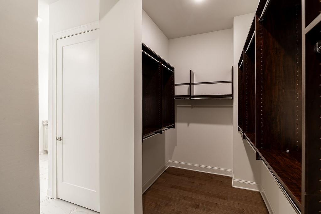 6954 Scenic Overlook Trace Flowery Branch, GA 30542 - Photo 32 of 55 wooden floor in an empty room