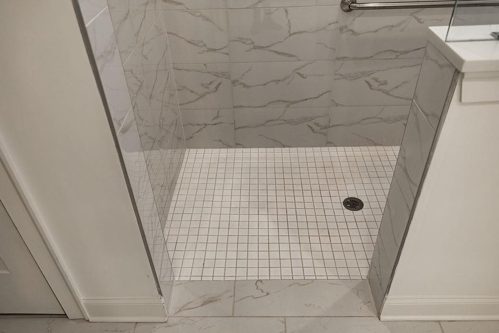 6954 Scenic Overlook Trace Flowery Branch, GA 30542 - Photo 38 of 55 a bathroom with a shower