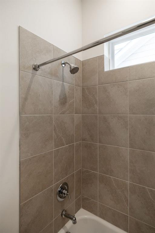 6954 Scenic Overlook Trace Flowery Branch, GA 30542 - Photo 40 of 55 a bathroom with a shower