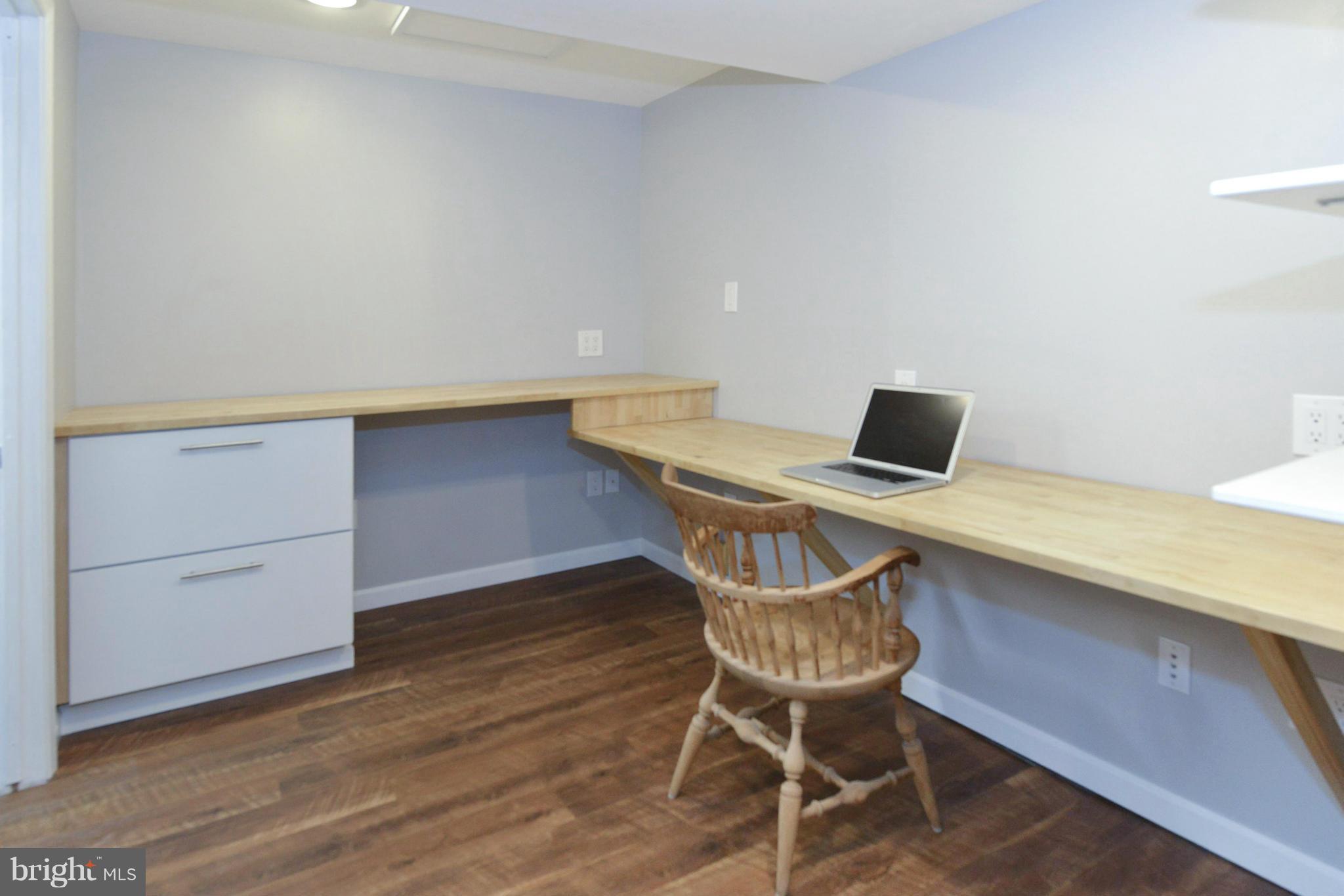 9100 Sudbury Road Silver Spring, MD 20901 - Photo 19 of 30 a view of a workspace with furniture
