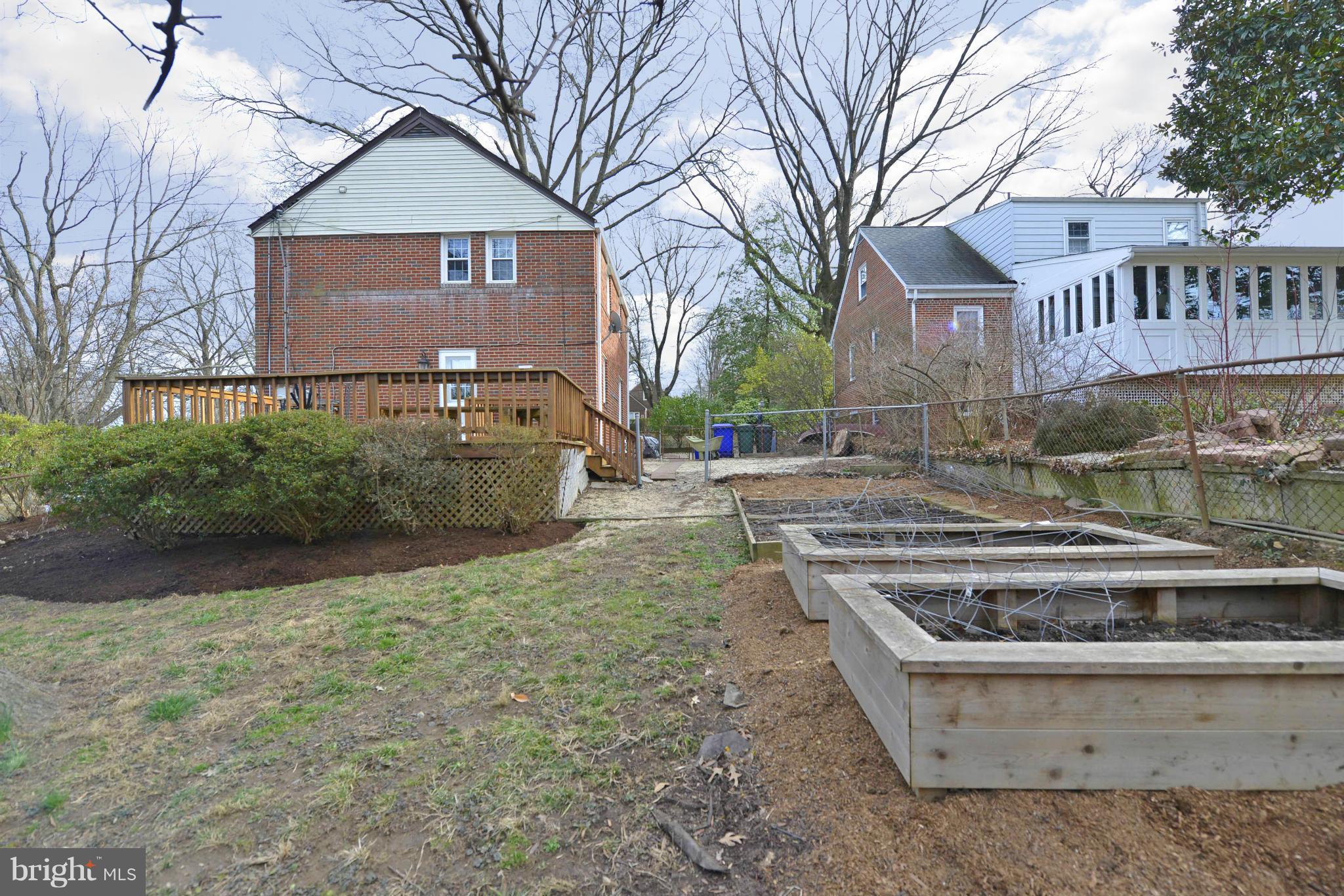 9100 Sudbury Road Silver Spring, MD 20901 - Photo 25 of 30 a front view of a house with garden