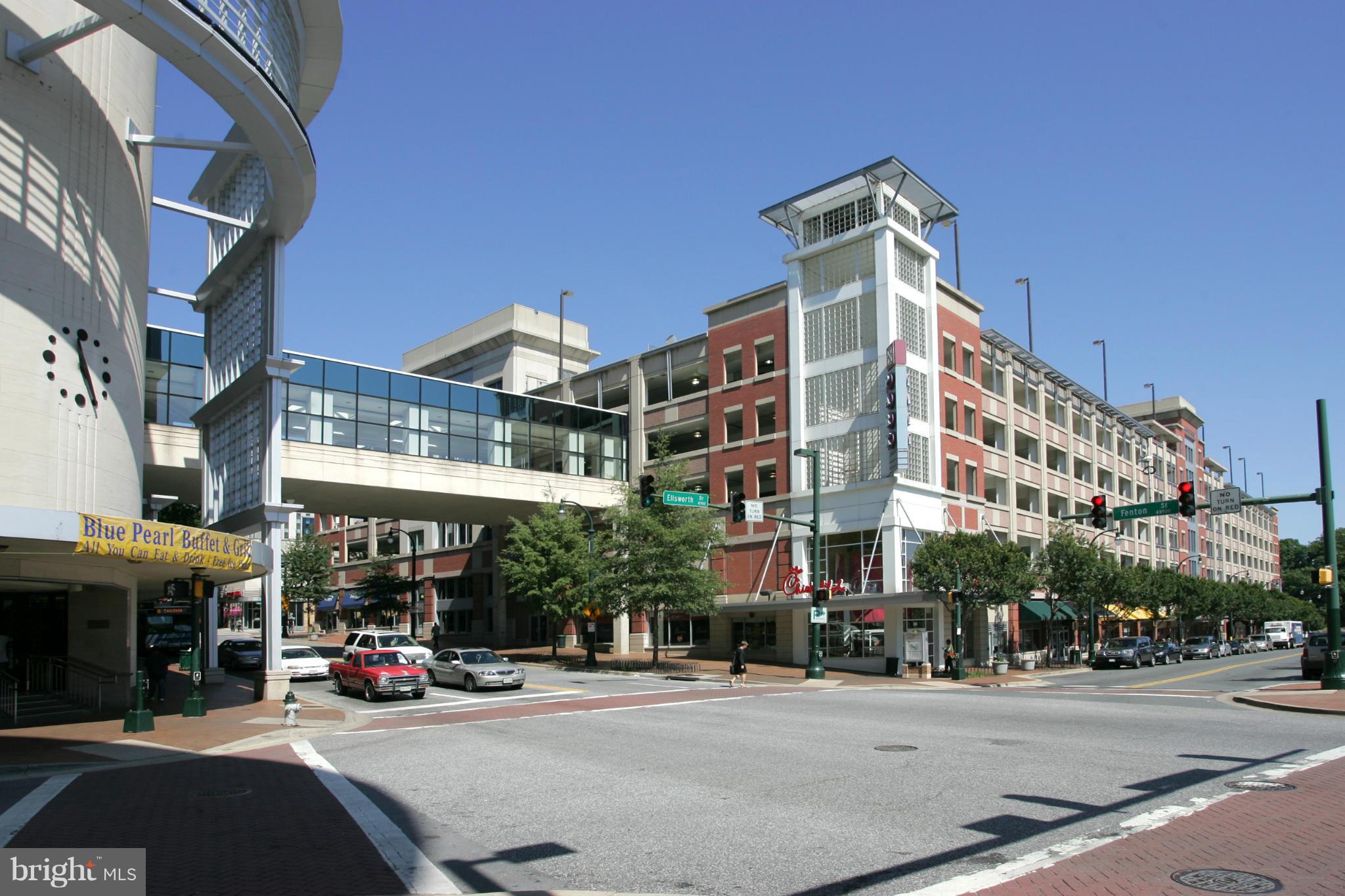 9100 Sudbury Road Silver Spring, MD 20901 - Photo 27 of 30 a view of a building and a street with cars