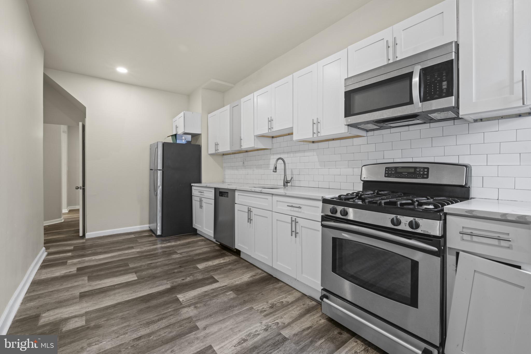 3030 Windsor Avenue Baltimore, MD 21216 - Photo 11 of 34 Kitchen with Stainless Steel Appliances