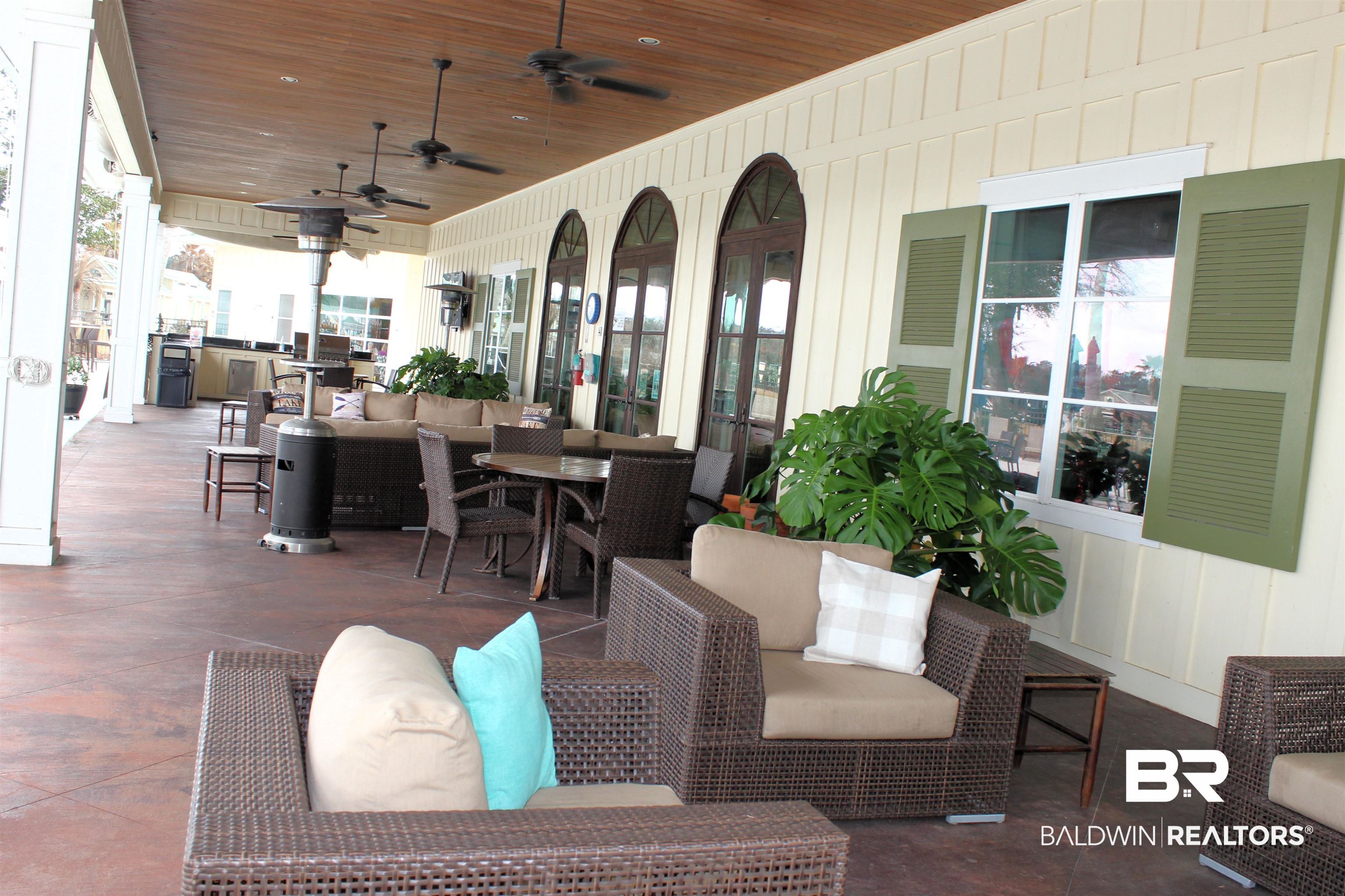 11869 Gateway Drive Elberta, AL 36530 - Photo 19 of 78 View of patio / terrace with outdoor lounge area, outdoor dining area, and a ceiling fan