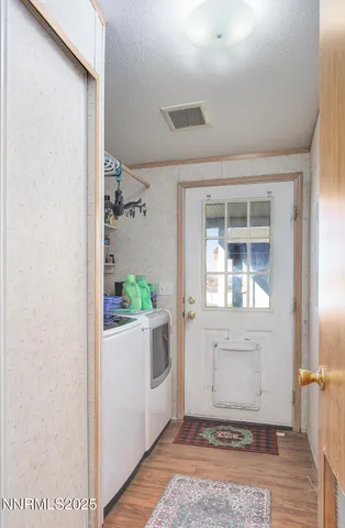 a view of a hallway with a outdoor space