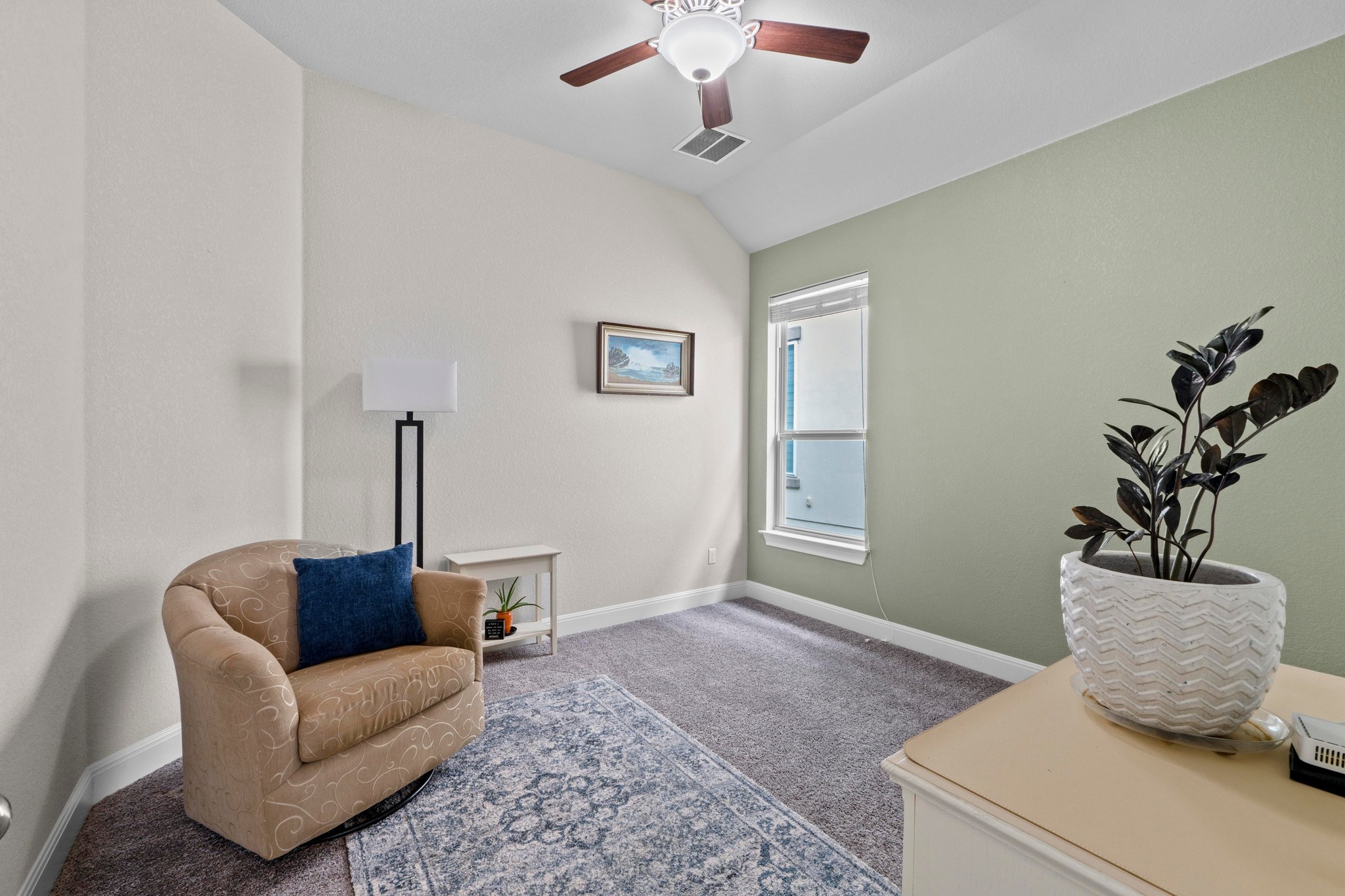 1329 Siena Sunset Road Leander, TX 78641 - Photo 25 of 33 a living room with furniture flowerpot and window