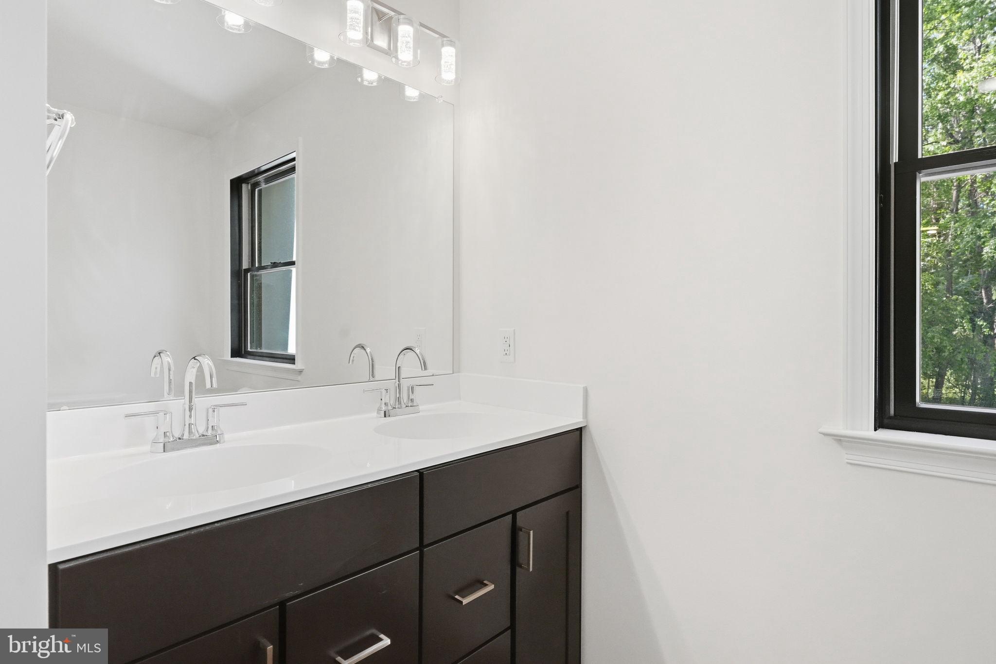410 East Rose Tree Road Media, PA 19063 - Photo 46 of 50 Hall Bath - dual sink