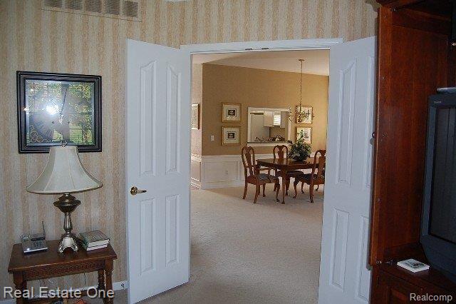 1126 Rock Valley Drive, Unit 47 Rochester, MI 48307 - Photo 9 of 14 Dining room from library
