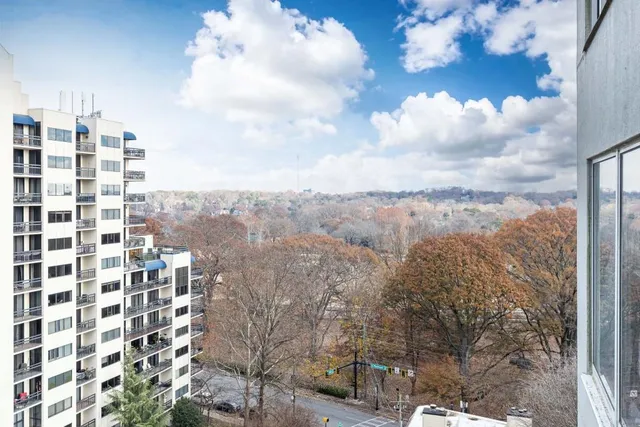 a view of a city with tall buildings