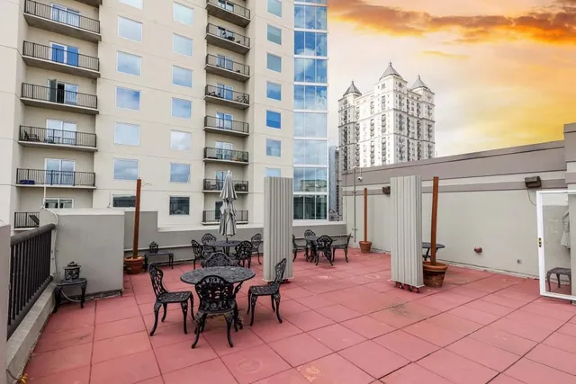 a view of a terrace with furniture