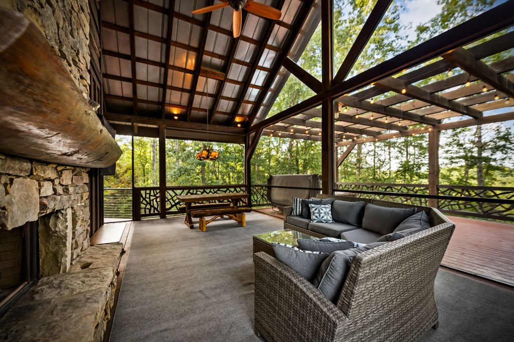 114 Price Circle Blue Ridge, GA 30513 - Photo 28 of 65 a outdoor living space with patio furniture and a fireplace