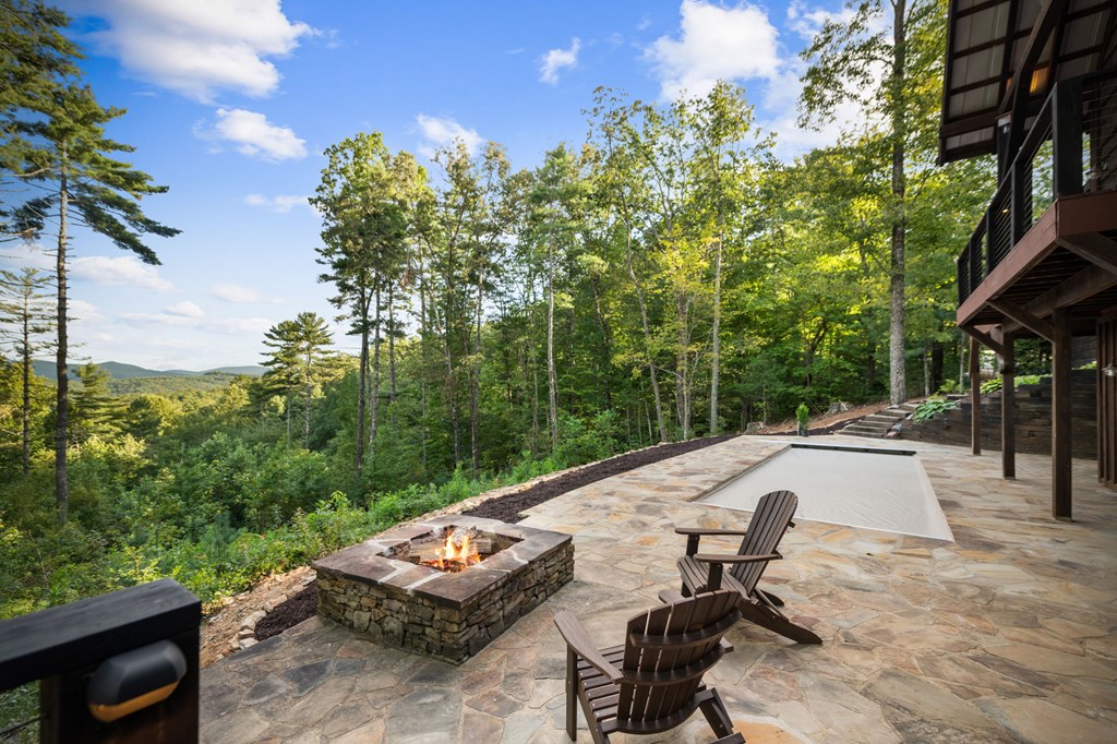 114 Price Circle Blue Ridge, GA 30513 - Photo 53 of 65 a view of a patio with swimming pool