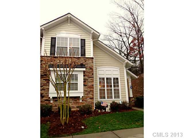904 Copperstone Lane, Unit 182 Fort Mill, SC 29708 - Photo 1 of 14 a front view of a house with garden