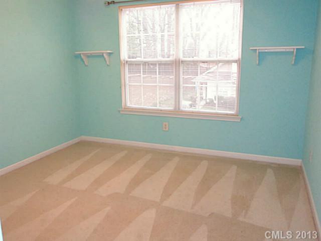 904 Copperstone Lane, Unit 182 Fort Mill, SC 29708 - Photo 12 of 14 an empty room with a window