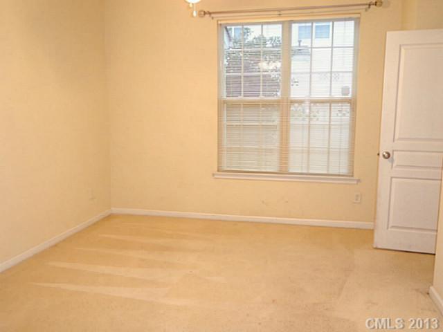 904 Copperstone Lane, Unit 182 Fort Mill, SC 29708 - Photo 13 of 14 an empty room with a window