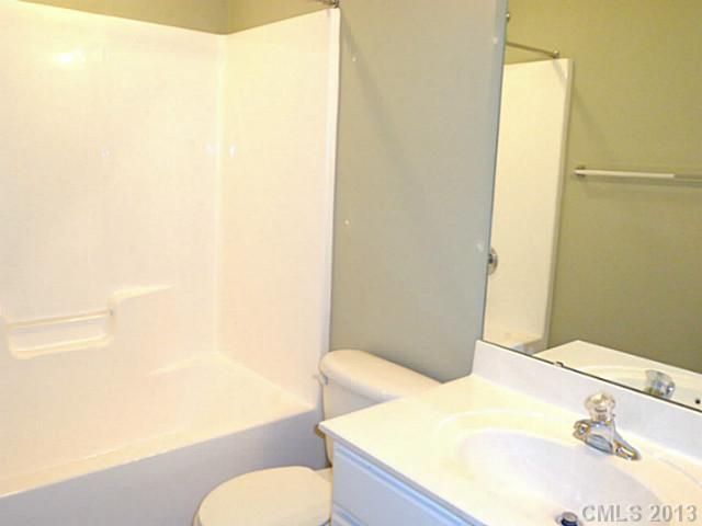 904 Copperstone Lane, Unit 182 Fort Mill, SC 29708 - Photo 14 of 14 a bathroom with a sink and a toilet