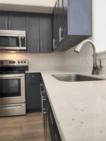 a view of building with parking space