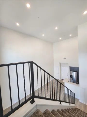 a view of a hallway with workspace