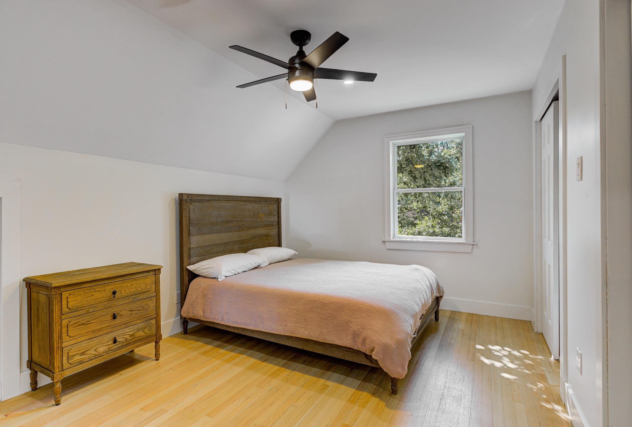 3914 Springfield Drive Memphis, TN 38128 - Photo 23 of 33 a bedroom with a bed and window
