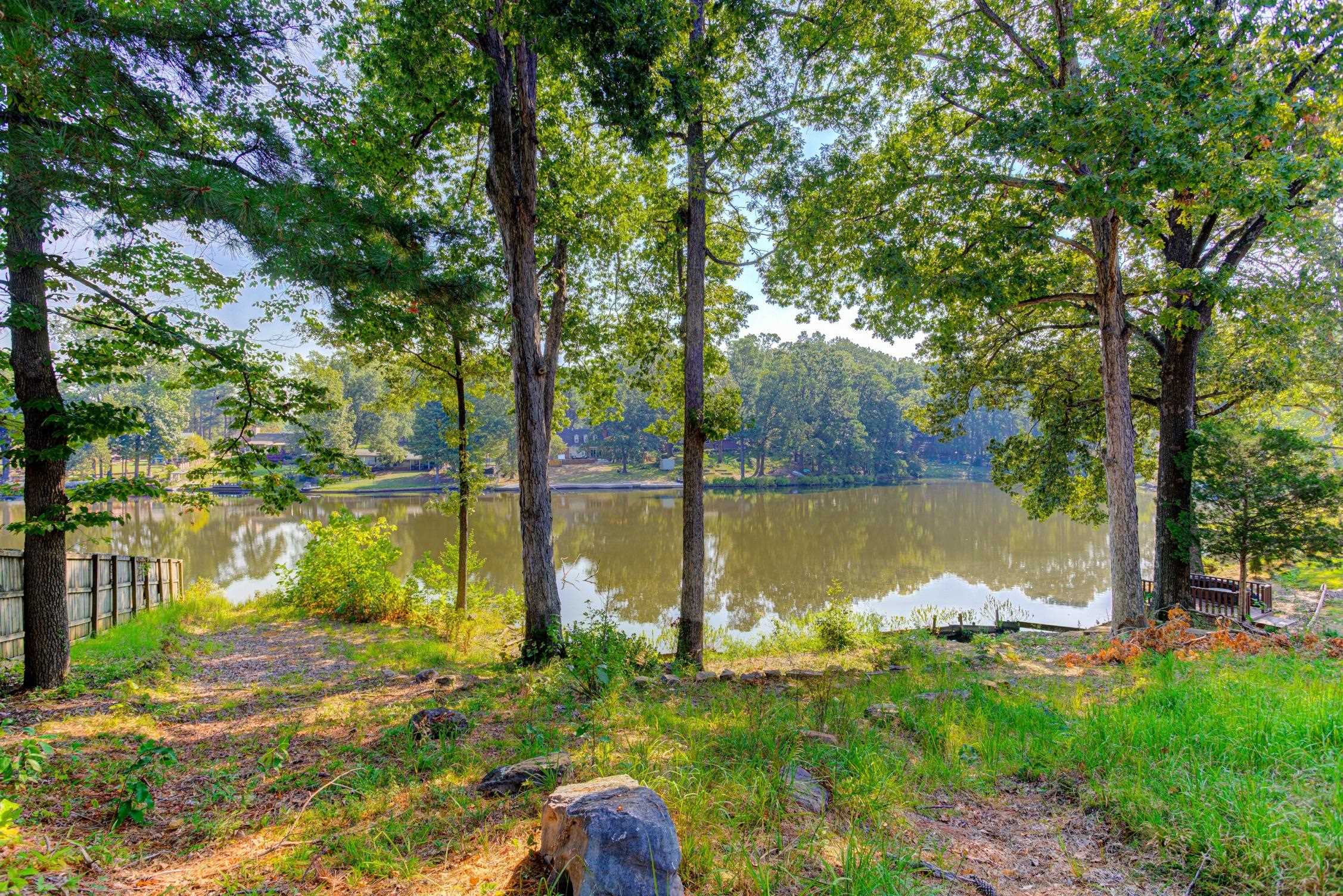 3914 Springfield Drive Memphis, TN 38128 - Photo 30 of 33 a view of a lake with a tree