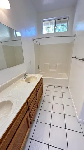 a view of wooden floor and a window
