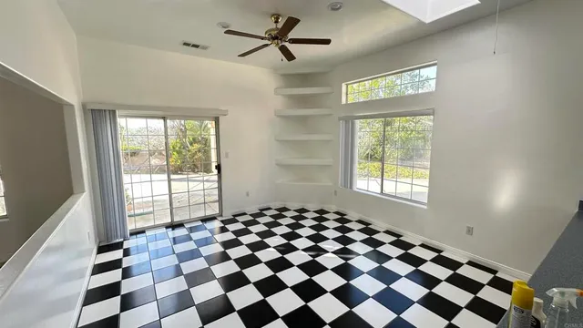 a black and white checkered floor with a black white checkered floor