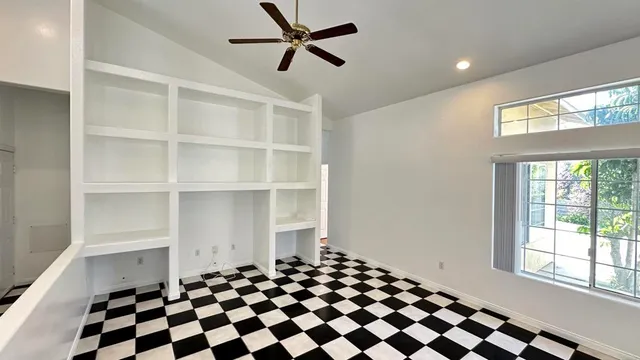 a view of an empty room and window