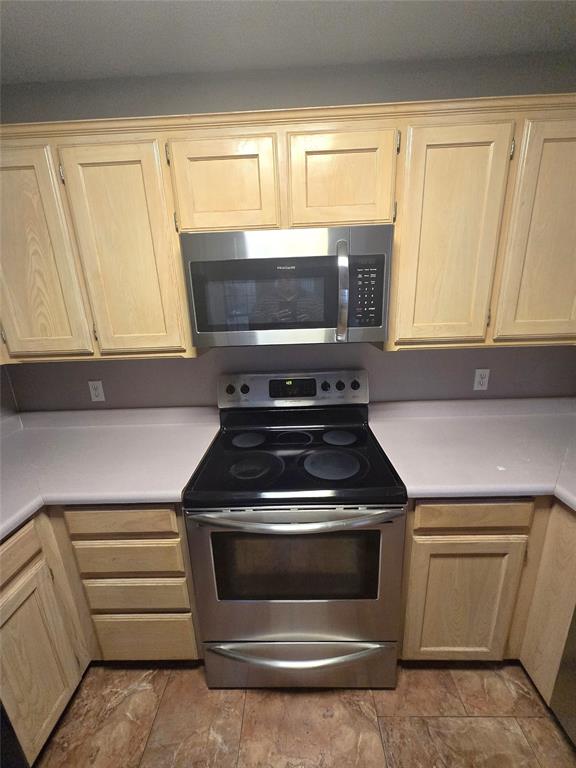 604 Valleyridge Court Decatur, TX 76234 - Photo 9 of 35 a stove top oven sitting inside of a kitchen