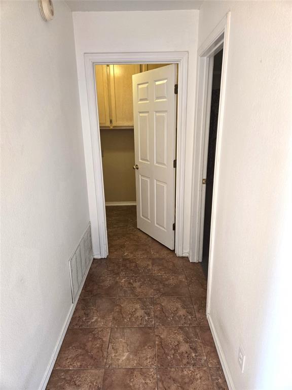 604 Valleyridge Court Decatur, TX 76234 - Photo 12 of 35 a view of entryway with wooden floor
