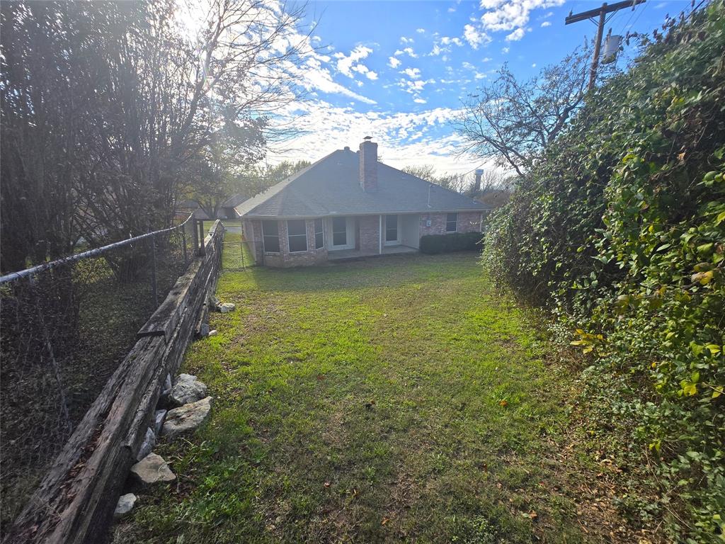 604 Valleyridge Court Decatur, TX 76234 - Photo 28 of 35 a view of a backyard