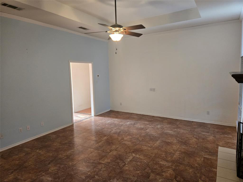 604 Valleyridge Court Decatur, TX 76234 - Photo 35 of 35 an empty room with a fan and a window