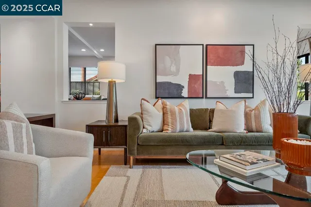 a living room with furniture and a lamp