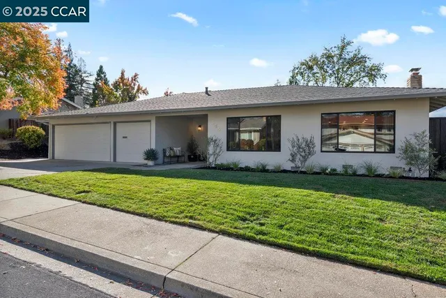a house view with a garden space