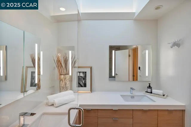 a view of a bedroom with a bed