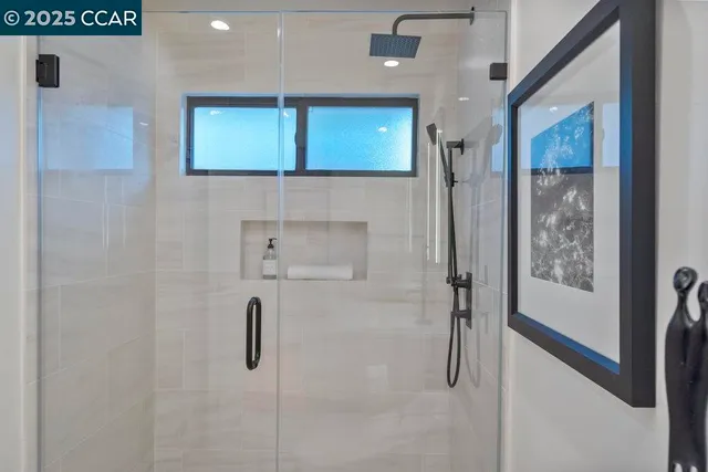 a view of backyard with swimming pool and outdoor seating