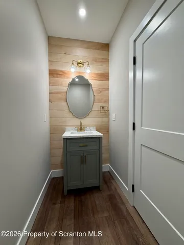 a view of hallway with mirror