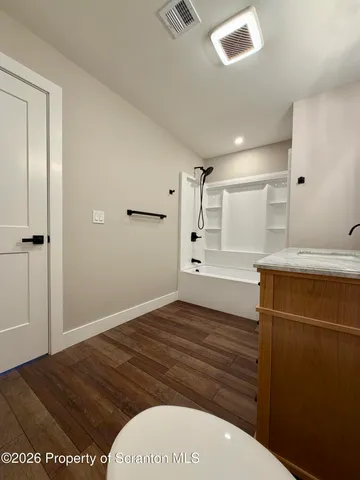 a bathroom with a sink and a toilet