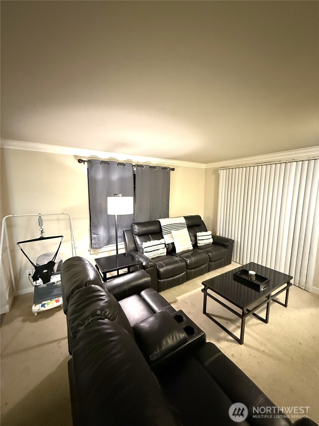 28716 18th Avenue South, Unit Y203 Federal Way, WA 98003 - Photo 11 of 37 a living room with furniture a rug and a window