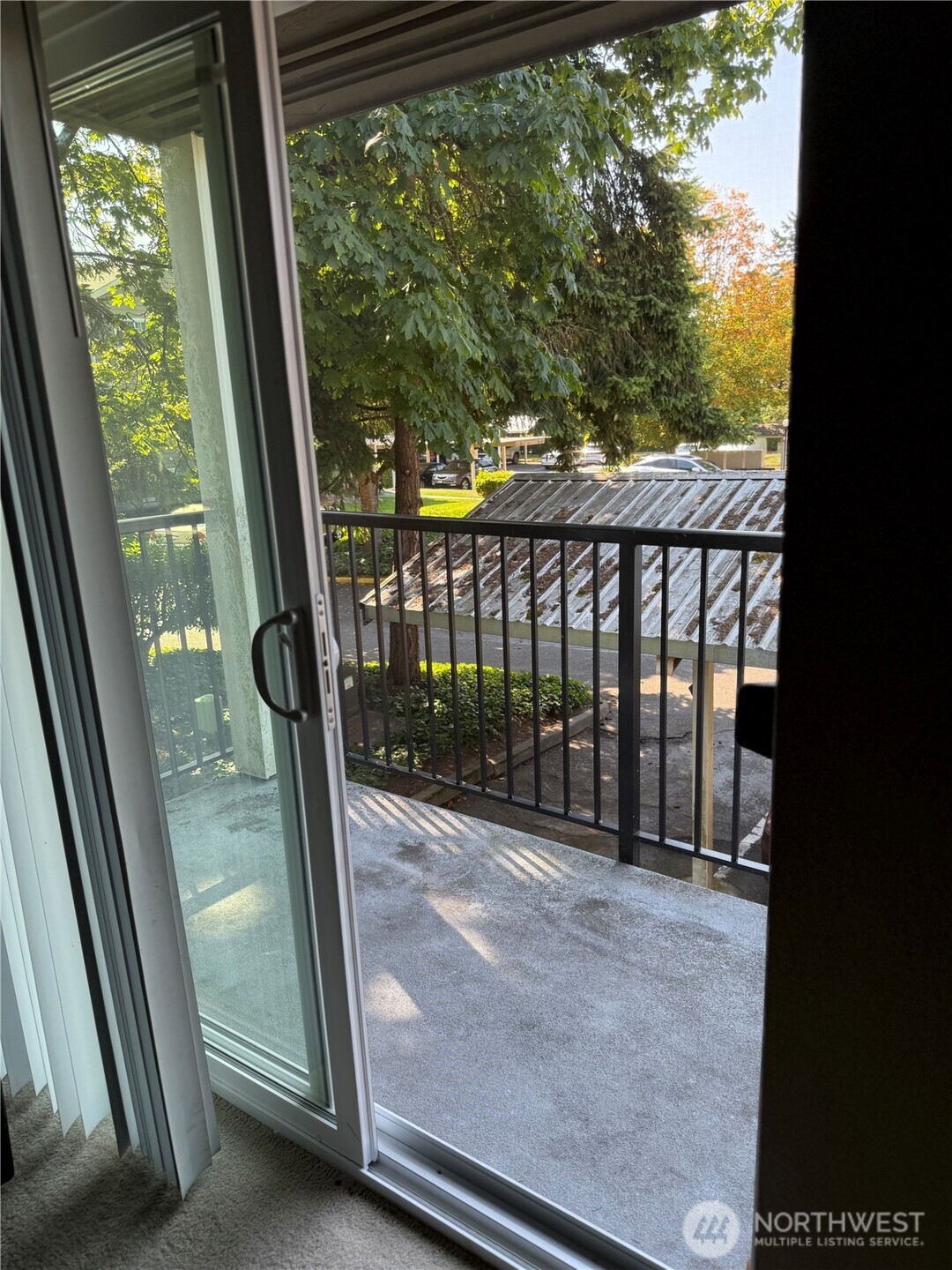 28716 18th Avenue South, Unit Y203 Federal Way, WA 98003 - Photo 13 of 37 a view of a glass door with a balcony