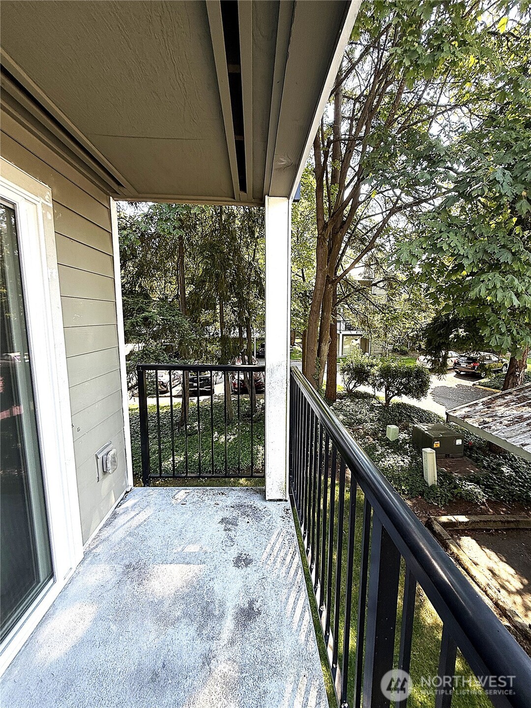 28716 18th Avenue South, Unit Y203 Federal Way, WA 98003 - Photo 15 of 37 a view of balcony with wooden floor and fence