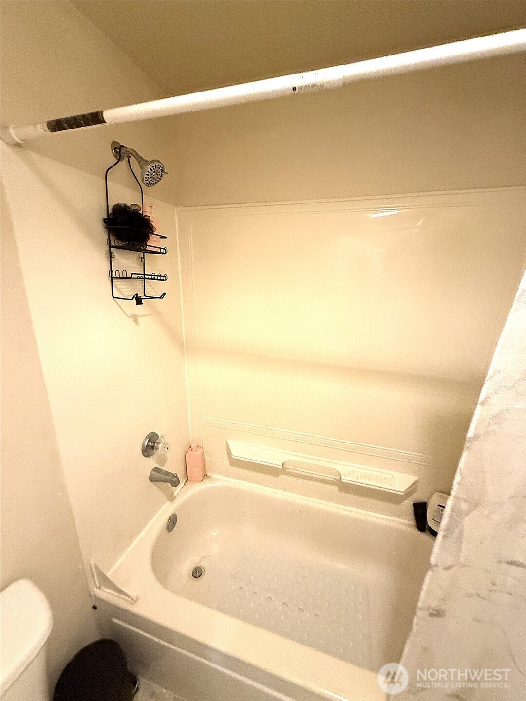 28716 18th Avenue South, Unit Y203 Federal Way, WA 98003 - Photo 24 of 37 a bathroom with a bathtub and toilet