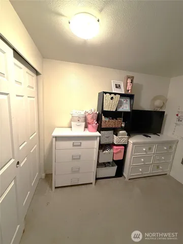 a utility room with washer and dryer