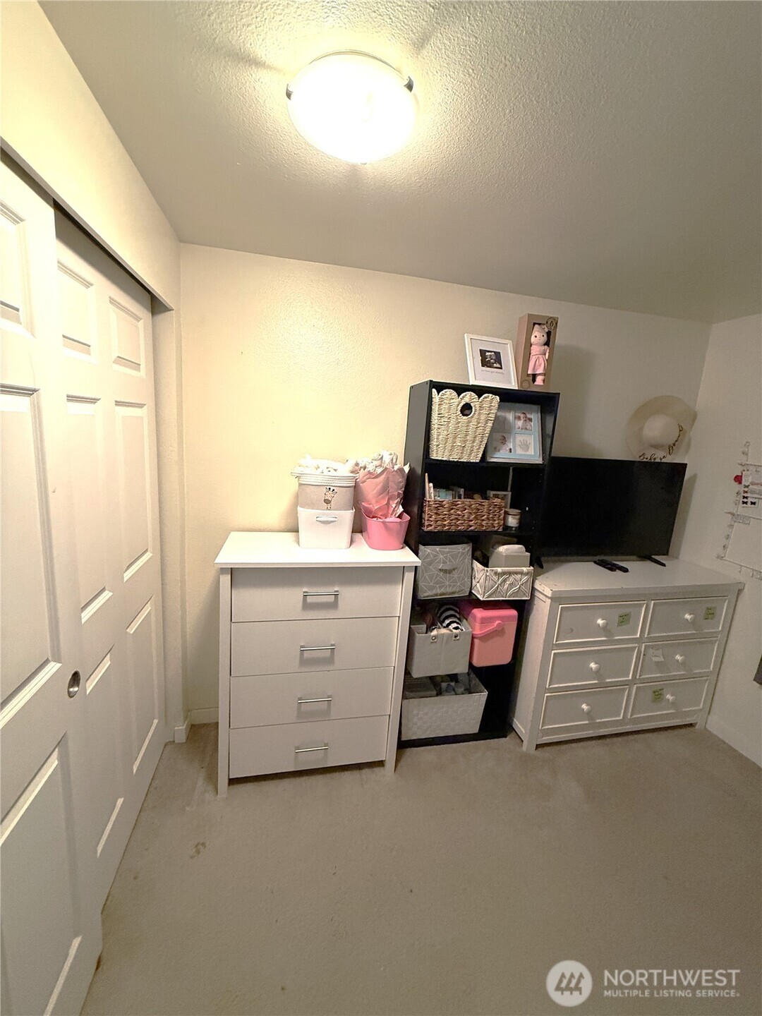 28716 18th Avenue South, Unit Y203 Federal Way, WA 98003 - Photo 26 of 37 a utility room with cabinets