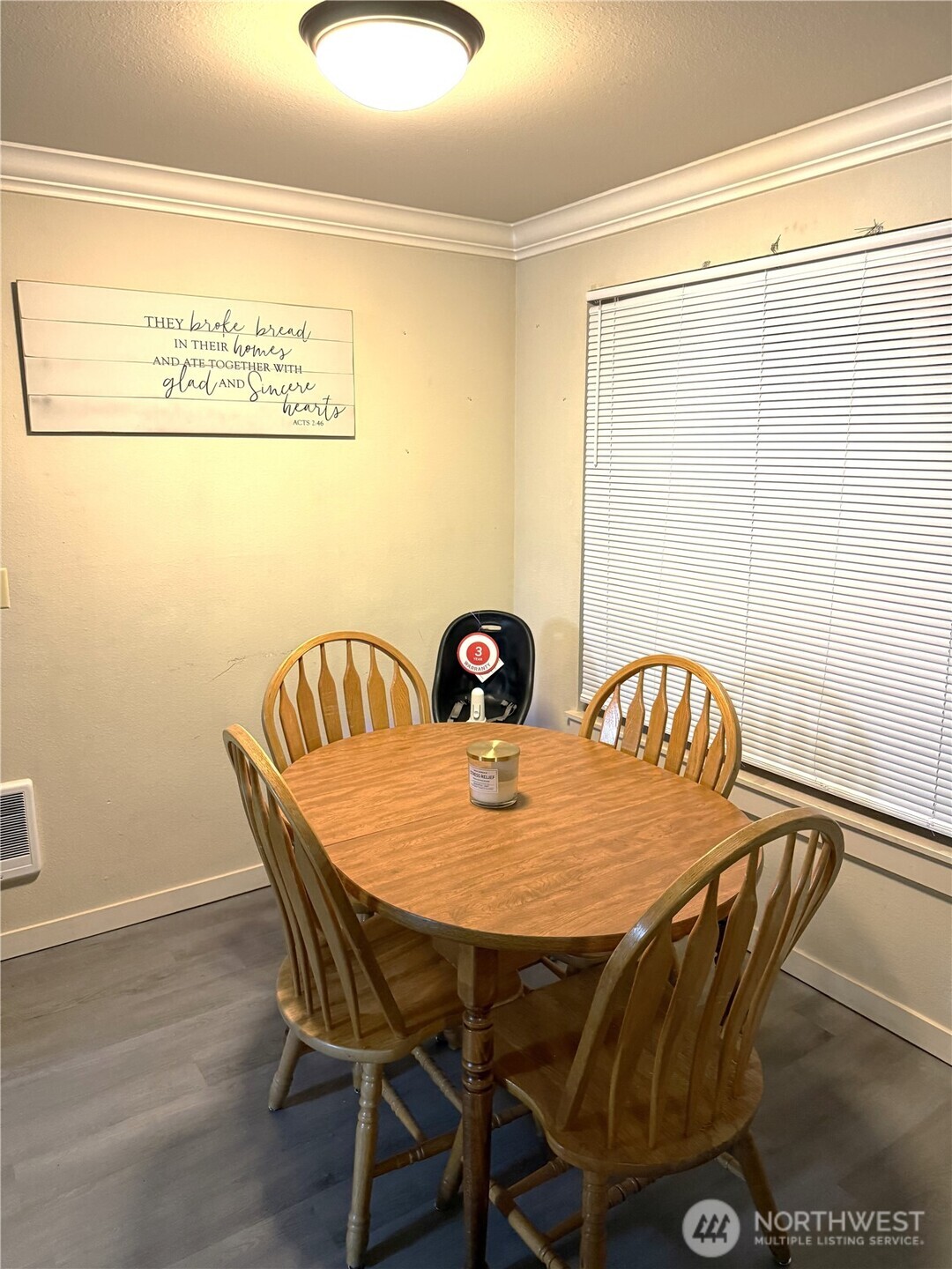 28716 18th Avenue South, Unit Y203 Federal Way, WA 98003 - Photo 7 of 37 a view of a dining room with furniture and wooden floor
