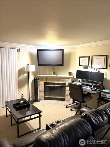 a bedroom with furniture and a piano