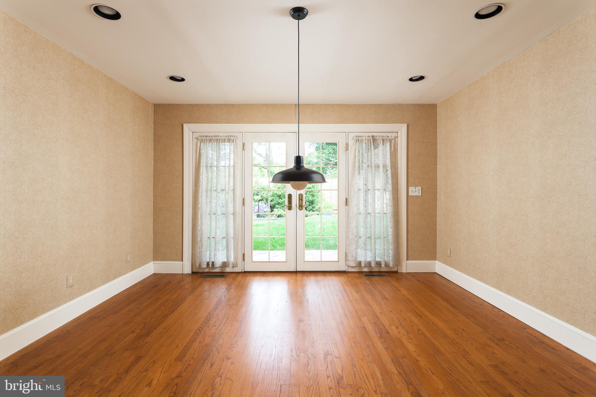 7109 Rich Hill Road Baltimore, MD 21212 - Photo 7 of 39 Dining Room with French doors