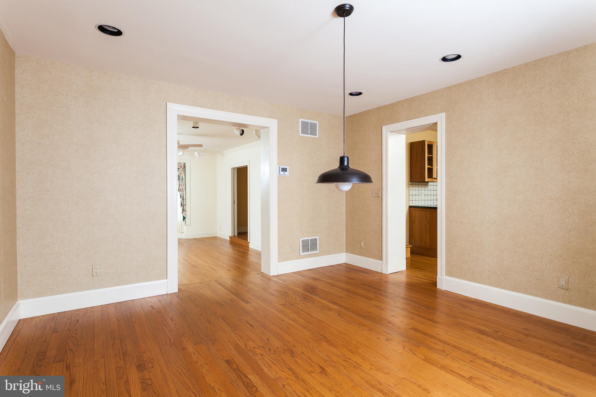 7109 Rich Hill Road Baltimore, MD 21212 - Photo 8 of 39 Dining Room with pocket door leading to kitchen
