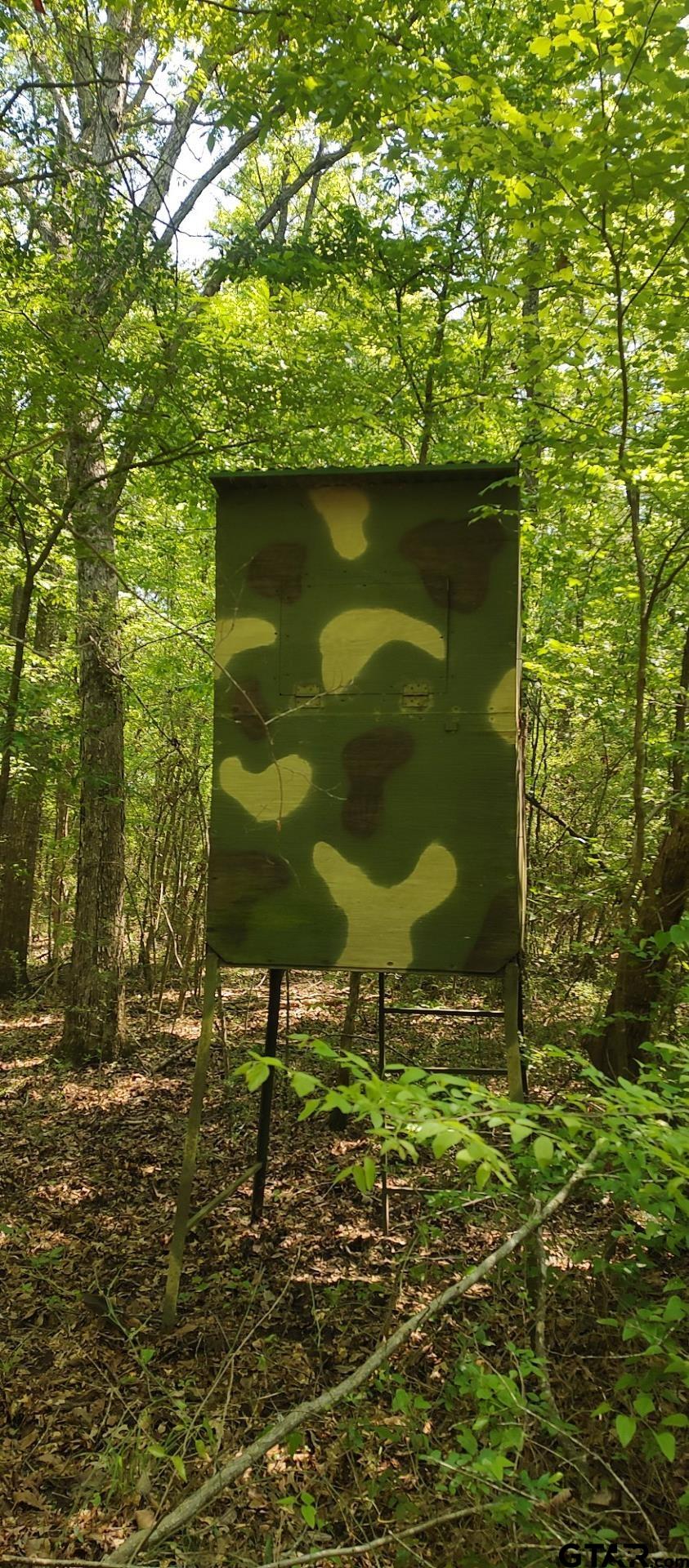 465 Barker Road Timpson, TX 75975 - Photo 14 of 34 a painting of a brick wall