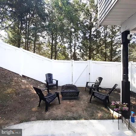 a view of a bench in the roof deck